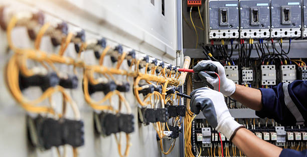 Professional Electrician technician working in Hunters Creek Village, TX